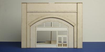 A 70-03 O gauge brick arch with shop fittings
